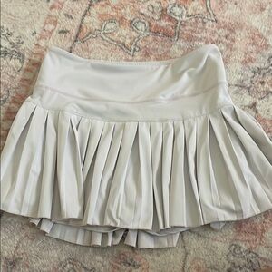 Gold Hinge pleated tennis skirt